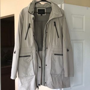Cream colored rain coat